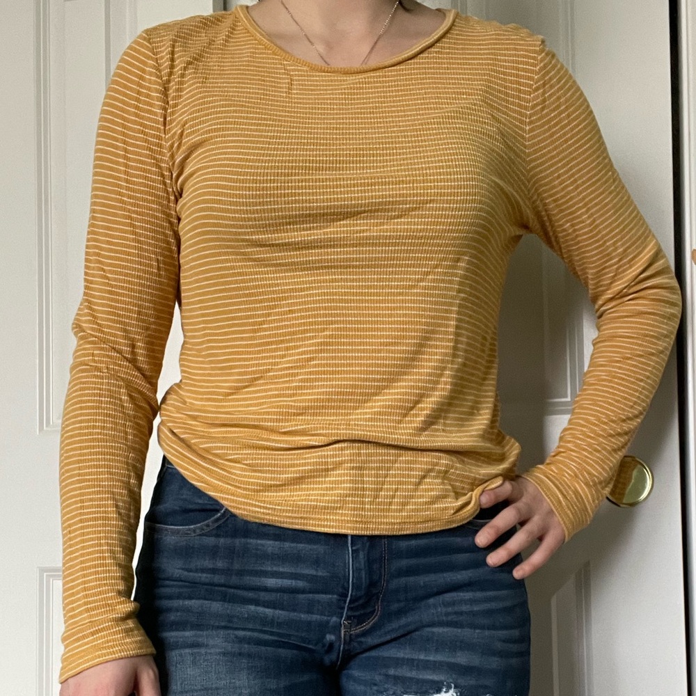Comfortable, thin, golden and white stripped long sleeve shirt!